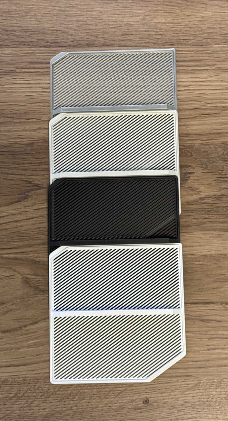 Top to Bottom: Silver, Light Gray, Black, White